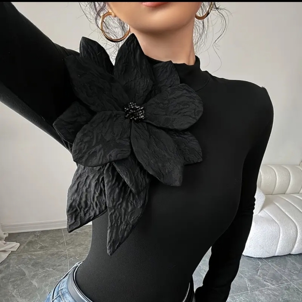 Love!Georgeous Black Long Sleeve Top with Floral Emblished Accent. Stunning Fit!